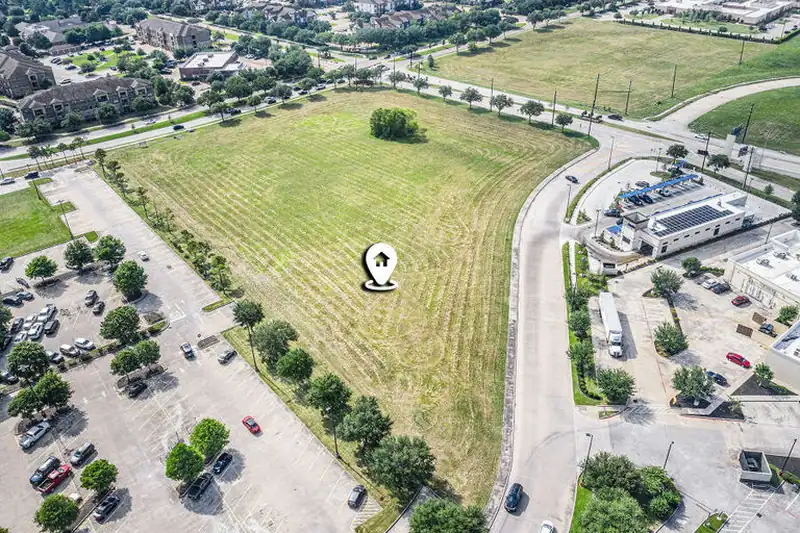 Aerial view of twenty acres of commercial land along a highway, Pearland, Texas