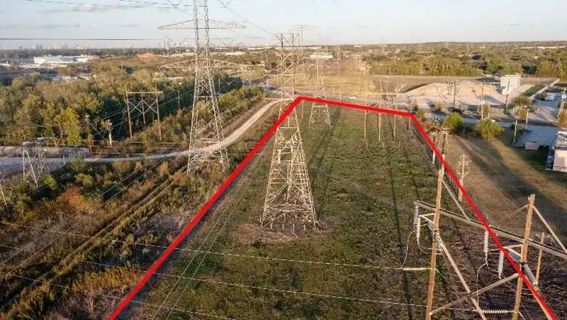 Aerial view of a 4.38 acre corner commercial parcel outlined, south Houston, Texas