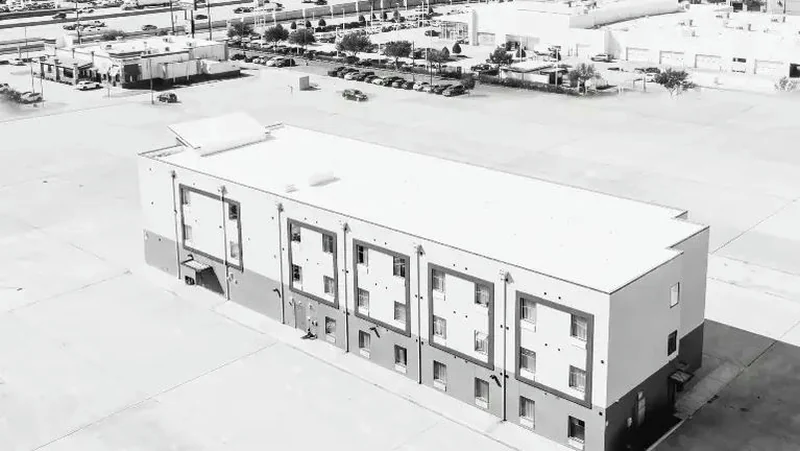 Exterior of a newly built three story extended stay hotel, Katy, Texas