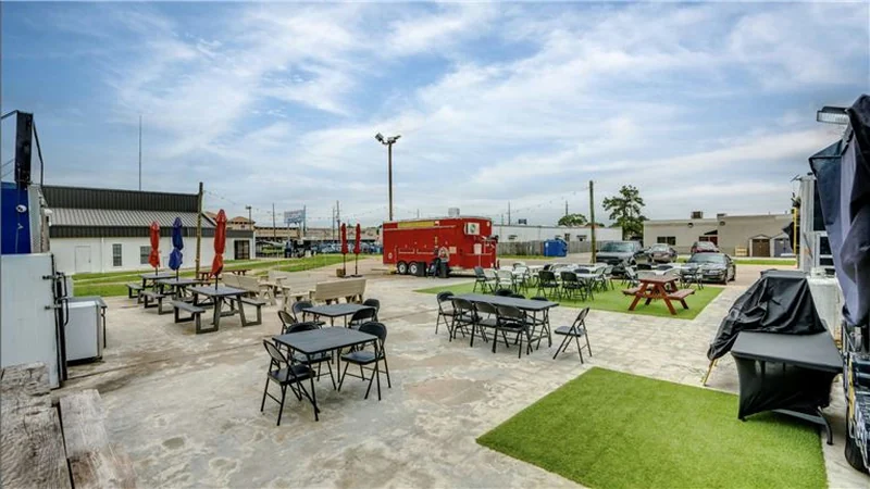 Food trucks parked at a multi tenant food truck hub, Houston, Texas