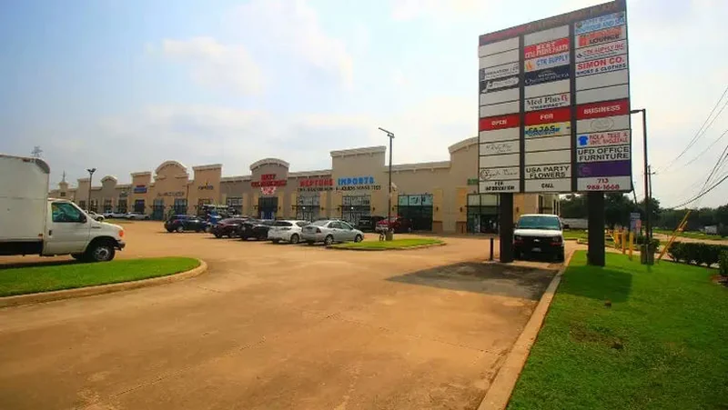 Retail condo storefront inside a multi unit plaza on Harwin Drive, Houston, Texas